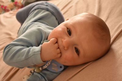 Portrait of cute baby lying down