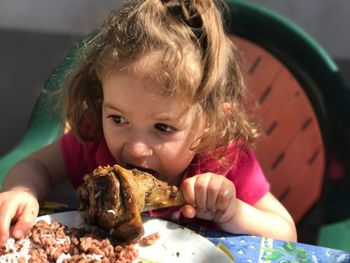 Close-up of girl eating