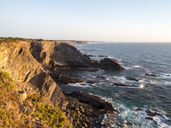 Scenic view of sea against clear sky