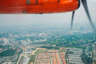 Aerial view of cityscape from the airplane window