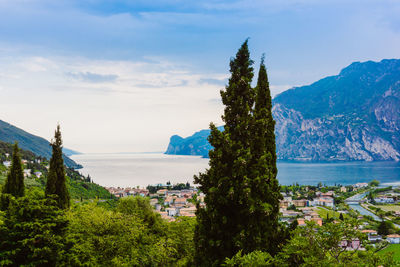 Panoramic view of sea and mountains against sky