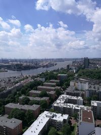 Aerial view of cityscape against sky