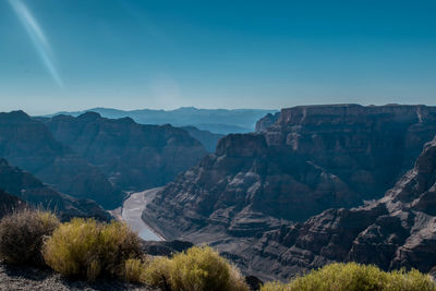 Scenic view of rocky mountains against clear sky