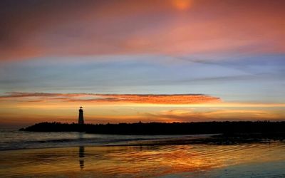 Scenic view of sea at sunset