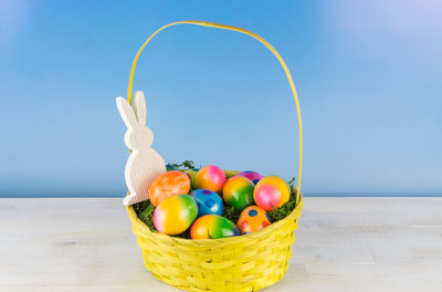 Close-up of fruits in basket on table