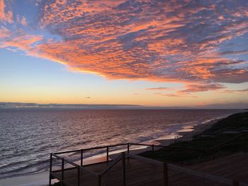 Scenic view of sea against dramatic sky