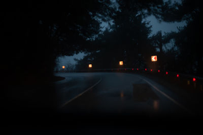 Cars on road at night