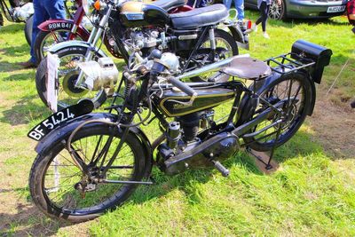 Bicycle parked on field