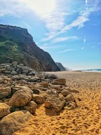 Scenic view of beach against sky