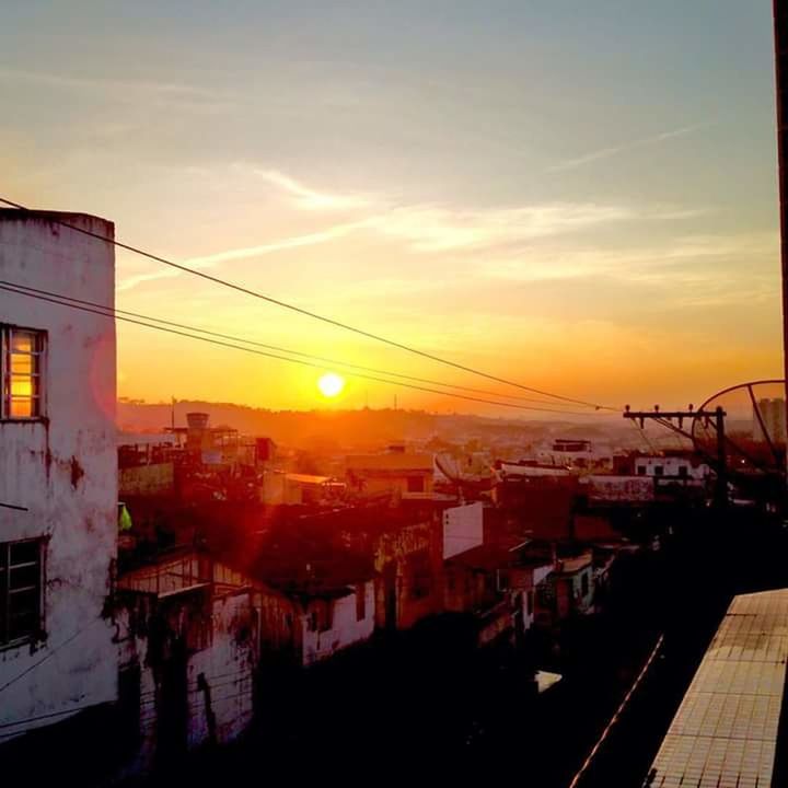 VIEW OF CITYSCAPE AGAINST SKY