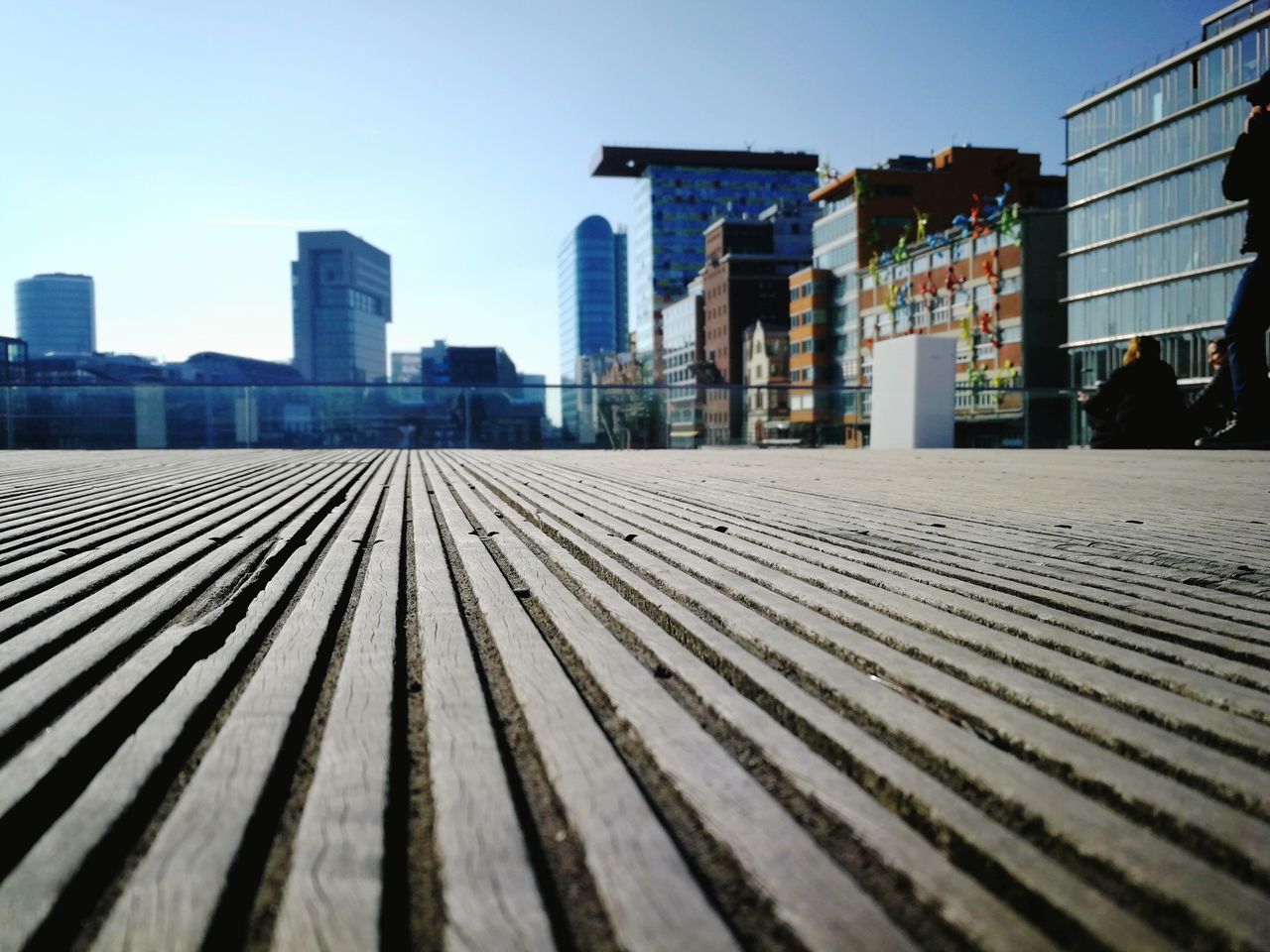 MODERN SKYSCRAPERS AGAINST CLEAR SKY