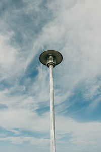 Low angle view of street light against sky