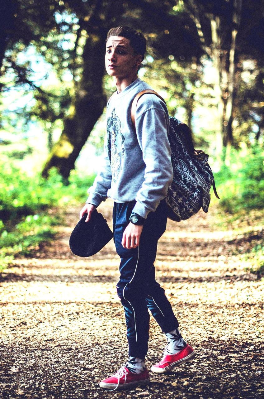 full length, casual clothing, lifestyles, leisure activity, childhood, person, elementary age, focus on foreground, boys, girls, sunlight, fun, arms outstretched, standing, tree, outdoors, carefree, front view