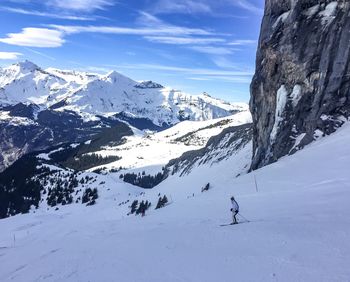 Scenic view of snowcapped mountain against sky