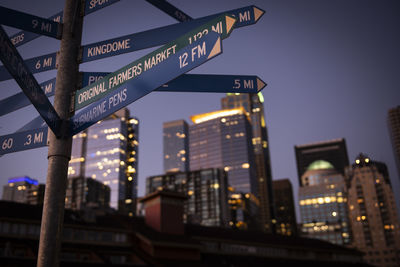 Low angle view of illuminated city at night, seattle 