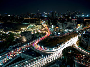 High angle view of illuminated cityscape at night