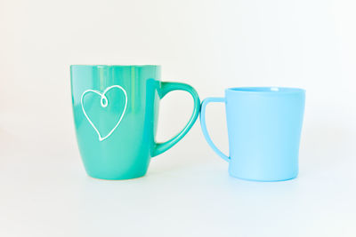 Close-up of coffee cup against white background