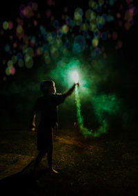 Full length of a child with with sparkler
