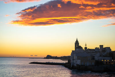 Sitges scenic view of sea against sky during sunset