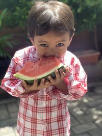 Portrait of girl eating food