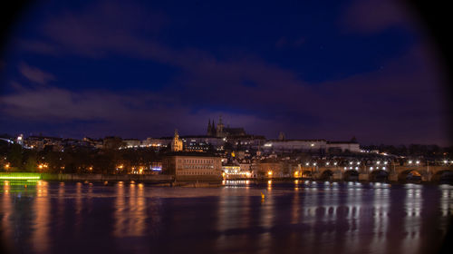 Illuminated buildings in city at night