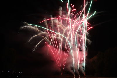 Firework display at night