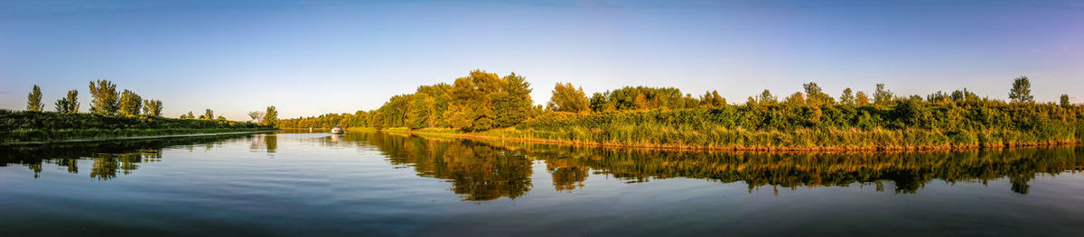 Scenic view of lake against clear sky