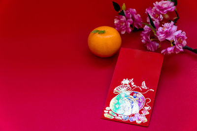 Close-up of orange flower in box