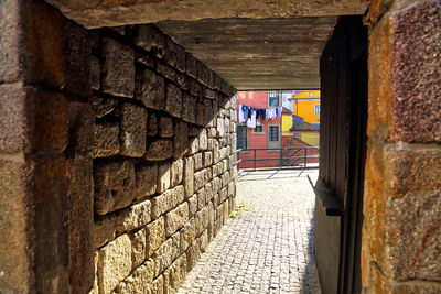 Narrow alley amidst buildings