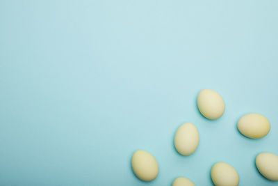 Close-up of pills against blue background