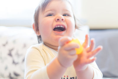 Close-up of cute boy eating food