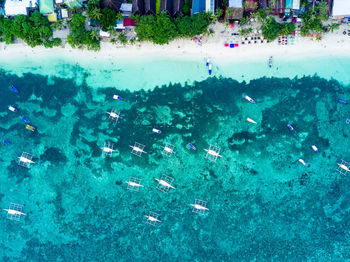 High angle view of people swimming in pool