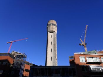 Bristol low angle view of  the historic grade ii lead shot tower against clear blue sky. 