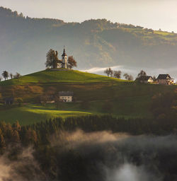 Scenic view of landscape and mountains against sky