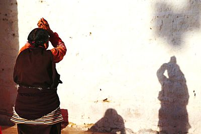 Woman standing in the dark