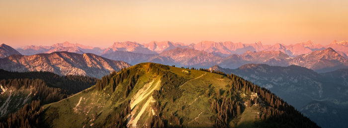 Panoramic view of mountains against sky during sunset