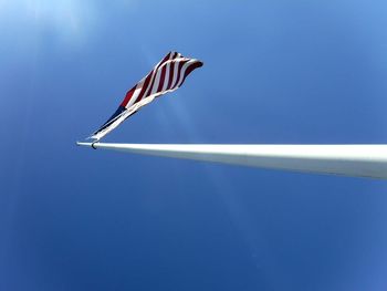 Low angle view of airplane flying in sky