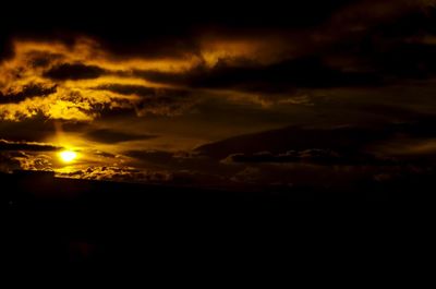 Scenic view of dramatic sky during sunset