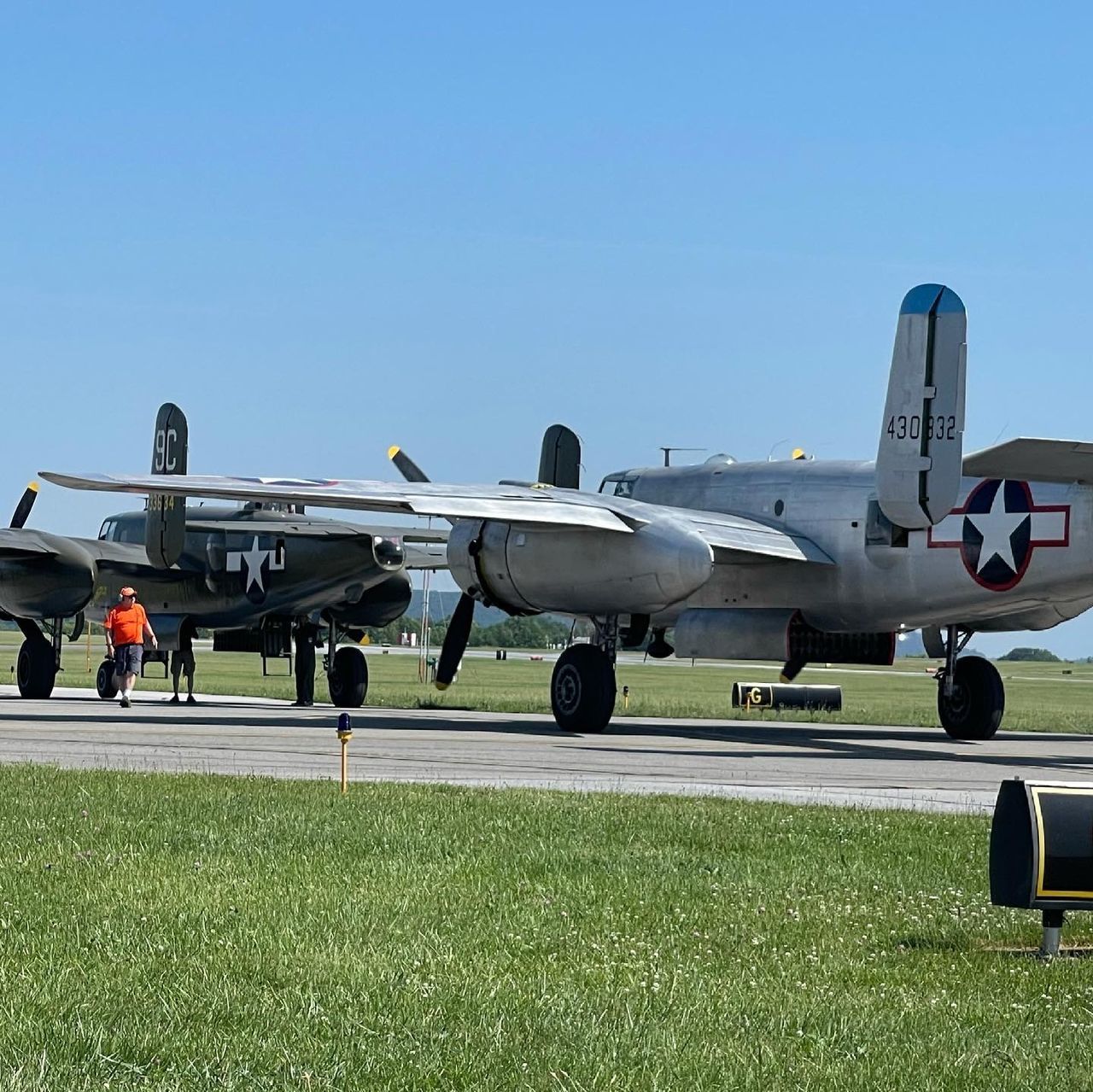 AIRPLANE ON RUNWAY AGAINST CLEAR SKY