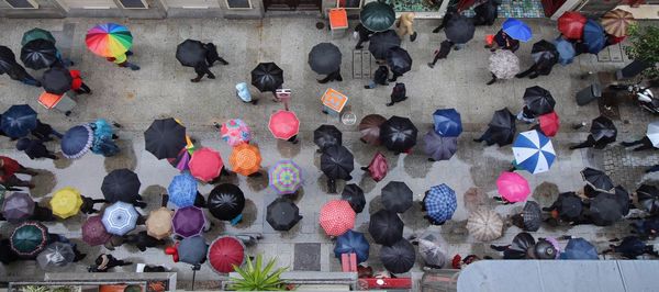 High angle view of people standing on street