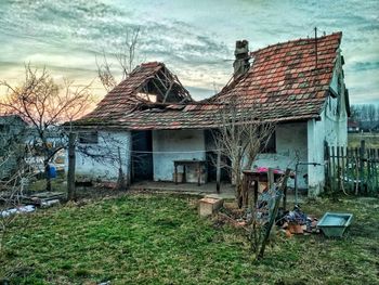 Abandoned house against sky