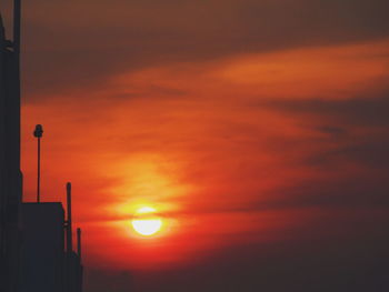 Scenic view of dramatic sky during sunset