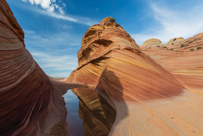 Panoramic view of rock formations against sky