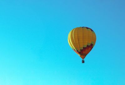 Hot air balloon on the blue background 