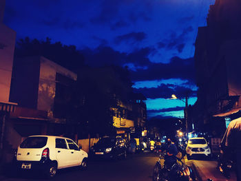 Traffic on city street at night