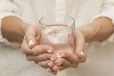 Close-up of hand holding drink