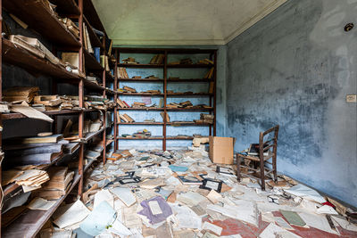 Bookshelf wood in abandoned villa