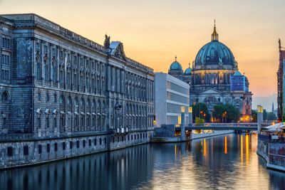 The river spree in berlin after sunset with the cathedral in the back