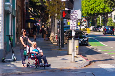 People on street in city