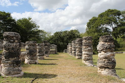 View of old ruins against cloudy sky